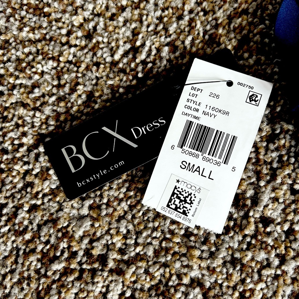 Brand new, tags still on. Navy blue halter dress with scalloped edges